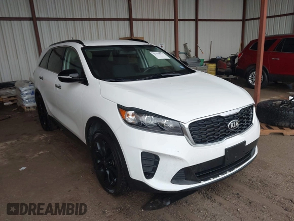 2019 Kia Sorento LX z VIN 5XYPG4A57KG609790, wystawiony jako IAAI lot #42199013 z przebiegiem 83 091 mil mil oraz . Historia ofert i sprzedaży dostępna na DreamBid. Obrazek 1.