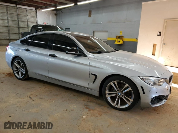 2015 BMW 4 Series 428i z VIN WBA4A5C51FG052009, wystawiony jako Copart lot #89110235 z przebiegiem 156 675 mil mil oraz Szkoda całkowita • Salvage title. Historia ofert i sprzedaży dostępna na DreamBid. Obrazek 4.