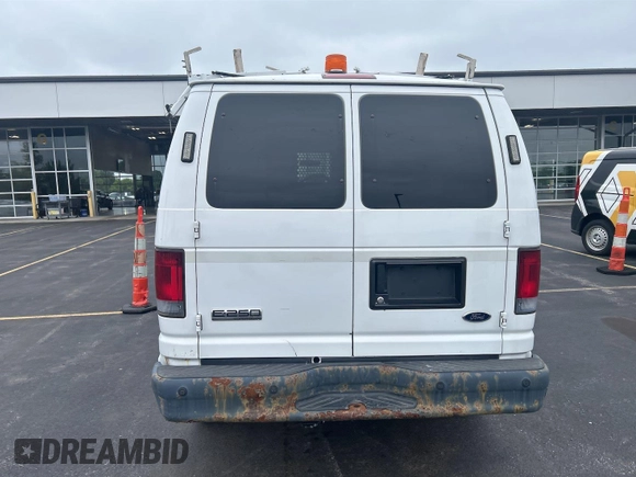 2010 Ford Econoline Cargo Commercial z VIN 1FTNE2EL2ADA74603, wystawiony jako IAAI lot #42511184 z przebiegiem 161 715 mil mil oraz . Historia ofert i sprzedaży dostępna na DreamBid. Obrazek 27.