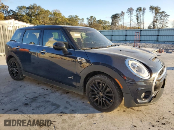 2017 MINI Clubman Cooper S with VIN WMWLU5C56H2E82110, listed as a Copart auction lot 79826004 with 82,756 mi miles and Clean Title. Bid and sale history available at carsss.com. Image 4.