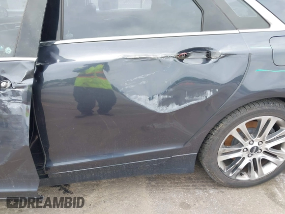 2013 Lincoln MKZ with VIN 3LN6L2JK1DR824359, listed as a IAAI auction lot 42340362 with 151,893 mi miles and . Bid and sale history available at DreamBid. Image 13.