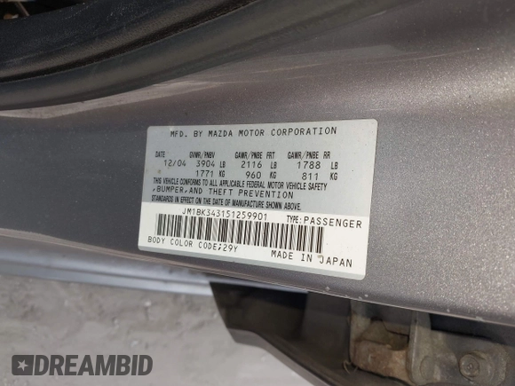 2005 Mazda 3 s with VIN JM1BK343151259901, listed as a IAAI auction lot 42028513 with 209,689 mi miles. Bid and sale history available at carsss.com. Image 9.