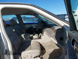 2000 Cadillac DeVille DTS z VIN 1G6KF5793YU222306, wystawiony jako IAAI lot #40810291 z przebiegiem 140 019 mil mil oraz . Historia ofert i sprzedaży dostępna na DreamBid. Obrazek 5.