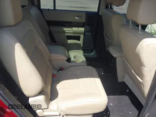 2014 Ford Flex SEL z VIN 2FMGK5C83EBD18039, wystawiony jako IAAI lot #42256317 z przebiegiem 104 941 mil mil oraz . Historia ofert i sprzedaży dostępna na DreamBid. Obrazek 8.