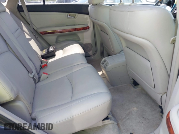 2007 Lexus RX with VIN 2T2GK31U07C021695, listed as a IAAI auction lot 42032252 with 146,023 mi miles. Bid and sale history available at carsss.com. Image 8.