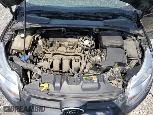 2012 Ford Focus SE with VIN 1FAHP3F22CL372232, listed as a Copart auction lot 59637645 with 134,337 mi miles and Salvage title. Bid and sale history available at DreamBid. Image 11.