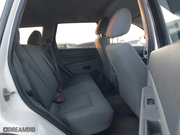2006 Jeep Grand Cherokee Laredo with VIN 1J8GS48K16C348315, listed as a IAAI auction lot 41062772 with 239,662 mi miles. Bid and sale history available at carsss.com. Image 8.