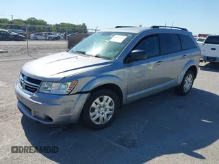 2018 Dodge Journey SE z VIN 3C4PDCAB8JT344720, wystawiony jako IAAI lot #40491703 z przebiegiem 86 601 mil mil oraz . Historia ofert i sprzedaży dostępna na DreamBid. Obrazek 2.