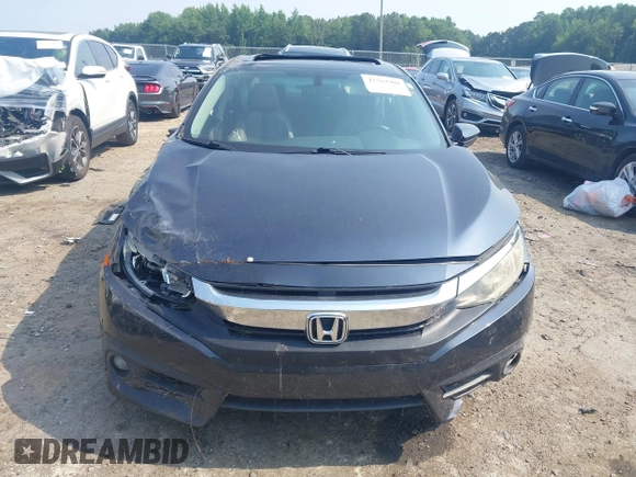 2016 Honda Civic EX-L with VIN 19XFC1F79GE003492, listed as a IAAI auction lot 42563306 with 166,420 mi miles and . Bid and sale history available at DreamBid. Image 12.