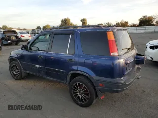 1999 Honda CR-V LX with VIN JHLRD1742XC066975, listed as a Copart auction lot 79447754 with 214,729 mi miles and Salvage Title. Bid and sale history available at carsss.com. Image 2.