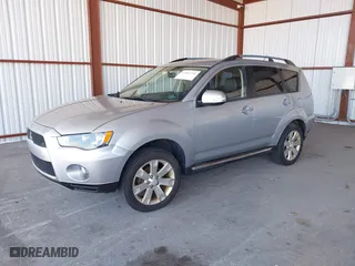 2013 Mitsubishi Outlander SE with VIN JA4JT3AW7DU012087, listed as a IAAI auction lot 41853230 with 162,824 mi miles. Bid and sale history available at carsss.com. Image 2.