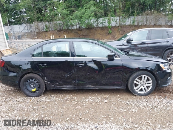 2017 Volkswagen Jetta S z VIN 3VW2B7AJ3HM303198, wystawiony jako IAAI lot #42651056 z przebiegiem 126 253 mil mil oraz . Historia ofert i sprzedaży dostępna na DreamBid. Obrazek 14.