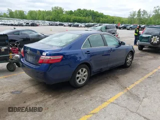 2009 Toyota Camry z VIN 4T1BE46K09U290607, wystawiony jako IAAI lot #42378997 z przebiegiem 214 501 mil mil oraz . Historia ofert i sprzedaży dostępna na DreamBid. Obrazek 4.