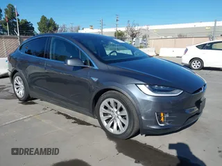 2016 Tesla Model X 70D with VIN 5YJXCBE24GF019450, listed as a IAAI auction lot 41517321 with 96,831 mi miles. Bid and sale history available at carsss.com. Image 1.