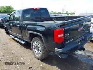 2016 GMC Sierra 2500HD Denali z VIN 1GT12UE84GF259750, wystawiony jako IAAI lot #42221632 z przebiegiem 201 055 mil mil oraz . Historia ofert i sprzedaży dostępna na DreamBid. Obrazek 3.