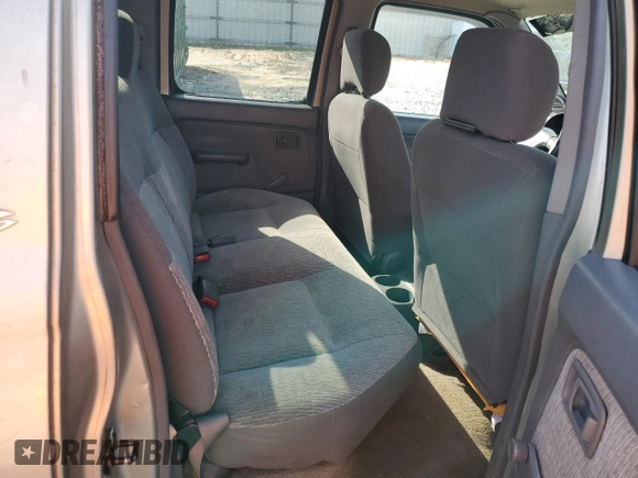 2000 Nissan Frontier XE with VIN 1N6ED27T8YC393355, listed as a Copart auction lot 49607575 with 241,813 mi miles and Salvage title. Bid and sale history available at DreamBid. Image 11.
