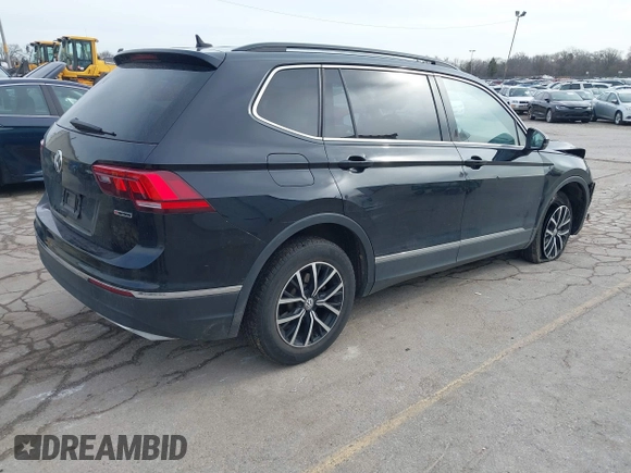 2021 Volkswagen Tiguan SE with VIN 3VV2B7AXXMM057849, listed as a IAAI auction lot 41879768 with 88,353 mi miles and . Bid and sale history available at DreamBid. Image 4.