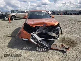 2025 BMW X1 xDrive28i with VIN WBX73EF03S5094250, listed as a Copart auction lot 51174465 with 51 mi miles and Salvage title. Bid and sale history available at DreamBid. Image 12.