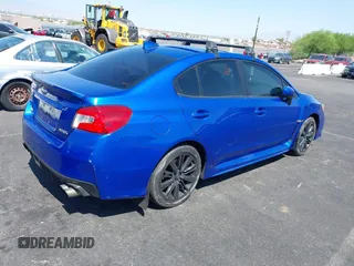 2015 Subaru WRX Premium with VIN JF1VA1D60F9830818, listed as a IAAI auction lot 40010134 with 120,575 mi miles and . Bid and sale history available at DreamBid. Image 4.