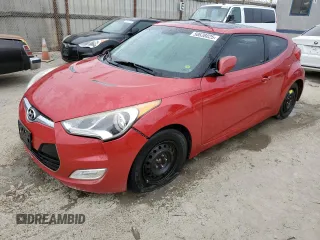 2012 Hyundai Veloster w/Gray Int z VIN KMHTC6AD8CU026797, wystawiony jako Copart lot #58638025 z przebiegiem 149 144 mil mil oraz Czysty tytuł • Clean title. Historia ofert i sprzedaży dostępna na DreamBid. Obrazek 1.