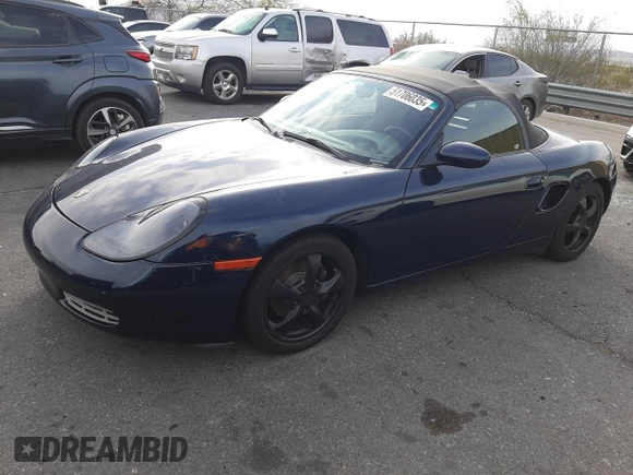 2000 Porsche Boxster z VIN WP0CA2981YU626756, wystawiony jako Copart lot #51706035 z przebiegiem 117 369 mil mil oraz Czysty tytuł • Clean title. Historia ofert i sprzedaży dostępna na DreamBid. Obrazek 1.