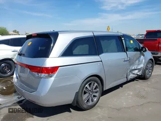 2014 Honda Odyssey Touring с VIN 5FNRL5H98EB070983, выставлен на аукционе IAAI как лот 42328380 с пробегом Не указан миль и . История ставок и продаж доступна на DreamBid. Изображение 4.