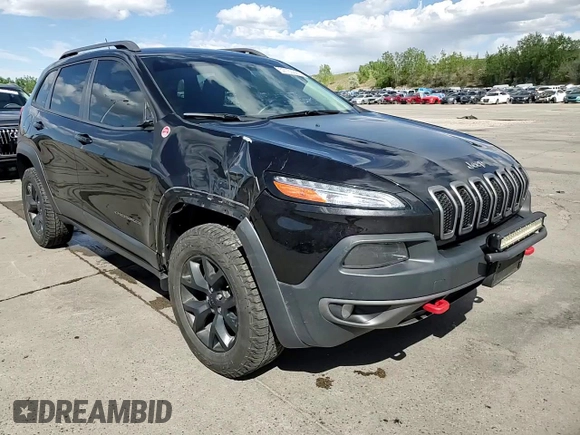2014 Jeep Cherokee Trailhawk z VIN 1C4PJMBS1EW239692, wystawiony jako Copart lot #57153065 z przebiegiem 111 899 mil mil oraz Szkoda całkowita • Salvage title. Historia ofert i sprzedaży dostępna na DreamBid. Obrazek 14.