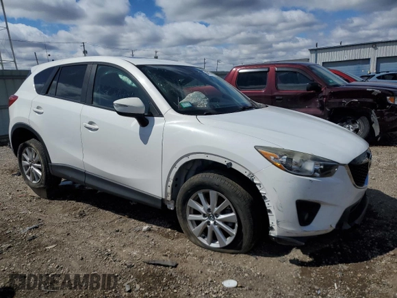 2015 Mazda CX-5 Touring with VIN JM3KE2CY2F0541400, listed as a Copart auction lot 52971015 with 131,569 mi miles and Clean Title. Bid and sale history available at carsss.com. Image 4.