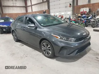 2023 Kia Forte LXS z VIN 3KPF24AD9PE691351, wystawiony jako IAAI lot #42187840 z przebiegiem 22 371 mil mil oraz . Historia ofert i sprzedaży dostępna na DreamBid. Obrazek 1.