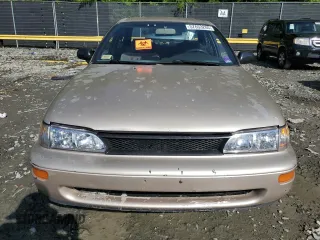 1995 Toyota Corolla DX with VIN 2T1AE09B0SC098739, listed as a Copart auction lot 57653205 with 154,226 mi miles and Salvage title. Bid and sale history available at DreamBid. Image 5.