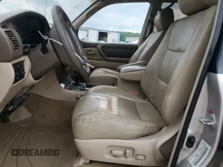 1999 Toyota Land Cruiser z VIN JT3HT05J9X0055914, wystawiony jako Copart lot #57261305 z przebiegiem 196 265 mil mil oraz Szkoda całkowita • Salvage title. Historia ofert i sprzedaży dostępna na DreamBid. Obrazek 7.