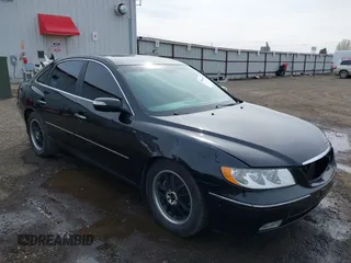 2007 Hyundai Azera SE with VIN KMHFC46F67A186034, listed as a IAAI auction lot 39181735 with 128,930 mi miles. Bid and sale history available at carsss.com. Image 1.