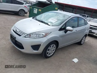 2013 Ford Fiesta SE z VIN 3FADP4BJ3DM207999, wystawiony jako IAAI lot #41880992 z przebiegiem 133 443 mil mil oraz . Historia ofert i sprzedaży dostępna na DreamBid. Obrazek 2.