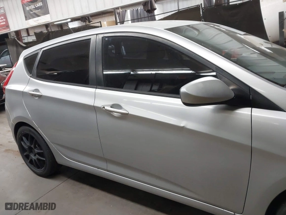 2013 Hyundai Accent GL with VIN KMHCT5AE3DU104651, listed as a IAAI auction lot 41522571 with 147,324 mi miles. Bid and sale history available at carsss.com. Image 13.