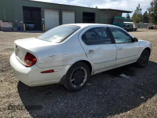 2000 Nissan Maxima GXE z VIN JN1CA31D0YT743476, wystawiony jako Copart lot #70160544 z przebiegiem 225 499 mil mil oraz Szkoda całkowita • Salvage title. Historia ofert i sprzedaży dostępna na DreamBid. Obrazek 3.