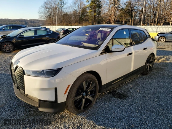 2022 BMW iX xDrive50 with VIN WB523CF02NCJ55045, listed as a Copart auction lot 87017454 with 35,801 mi miles and Salvage Title. Bid and sale history available at carsss.com. Image 1.