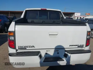 2008 Honda Ridgeline RTL z VIN 2HJYK165X8H518321, wystawiony jako IAAI lot #41763883 z przebiegiem 97 027 mil mil oraz . Historia ofert i sprzedaży dostępna na DreamBid. Obrazek 16.