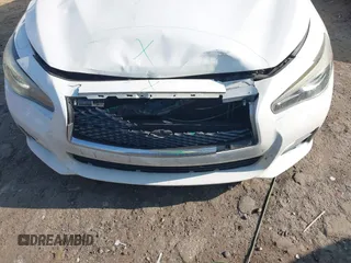 2015 Infiniti Q50 Premium z VIN JN1BV7AP5FM333958, wystawiony jako IAAI lot #42351044 z przebiegiem 158 428 mil mil oraz . Historia ofert i sprzedaży dostępna na DreamBid. Obrazek 6.