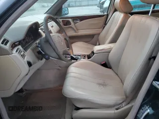 1998 Mercedes-Benz E 320 with VIN WDBJF25F0WA684027, listed as a Copart auction lot 82171114 with 259,427 mi miles and Salvage Title. Bid and sale history available at DreamBid. Image 7.