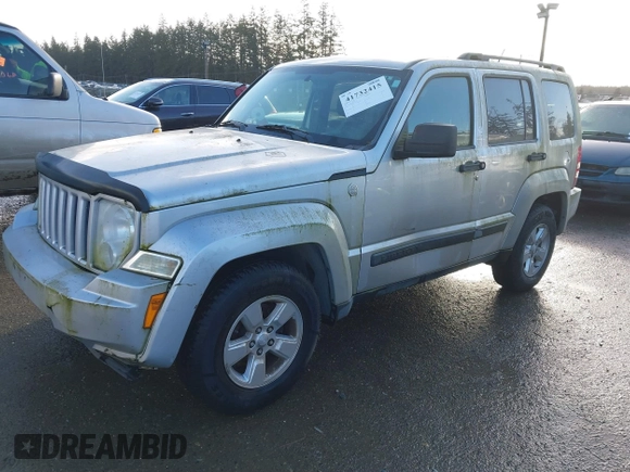 2010 Jeep Liberty Sport with VIN 1J4PN2GK0AW153442, listed as a IAAI auction lot 41732415 with 206,834 mi miles. Bid and sale history available at carsss.com. Image 2.