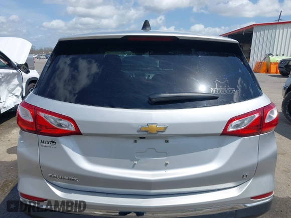 2021 Chevrolet Equinox LT with VIN 2GNAXKEV3M6129404, listed as a IAAI auction lot 41779923 with 113,615 mi miles and . Bid and sale history available at DreamBid. Image 16.