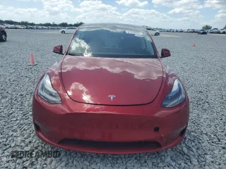 2024 Tesla Model Y Performance with VIN 7SAYGDEF1RF052175, listed as a Copart auction lot 51743895 with 4,869 mi miles and Salvage Title. Bid and sale history available at DreamBid. Image 5.