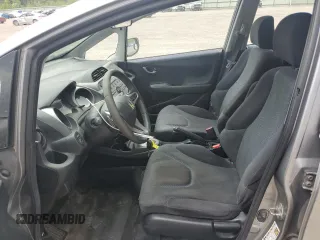 2009 Honda Fit Sport with VIN JHMGE88469S064405, listed as a Copart auction lot 61413745 with 179,497 mi miles and Salvage title. Bid and sale history available at DreamBid. Image 7.
