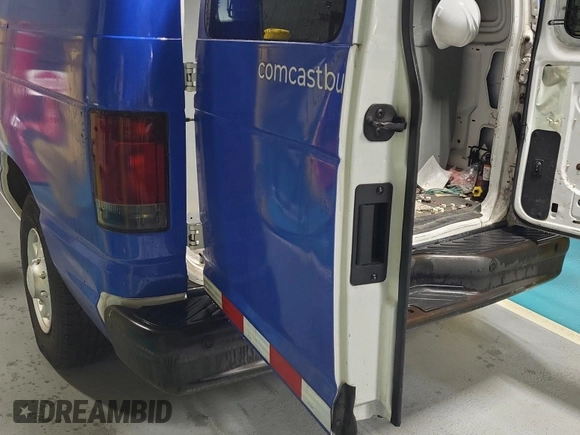 2011 Ford Econoline Cargo Commercial with VIN 1FTNE2EL2BDB34977, listed as a IAAI auction lot 42122024 with 154,154 mi miles. Bid and sale history available at carsss.com. Image 1.