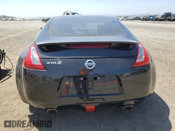 2016 Nissan 370Z with VIN JN1AZ4EH0GM934438, listed as a Copart auction lot 52772294 with 57,929 mi miles. Bid and sale history available at carsss.com. Image 6.