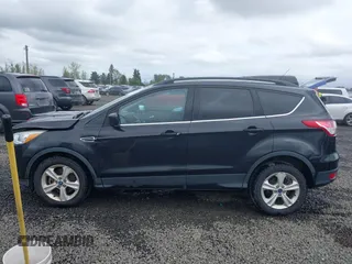 2015 Ford Escape SE with VIN 1FMCU9G98FUA26059, listed as a IAAI auction lot 41991222 with 149,298 mi miles and . Bid and sale history available at DreamBid. Image 15.
