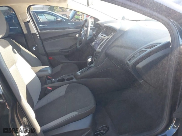 2014 Ford Focus SE with VIN 1FADP3F22EL254828, listed as a IAAI auction lot 40645189 with 108,915 mi miles. Bid and sale history available at carsss.com. Image 5.