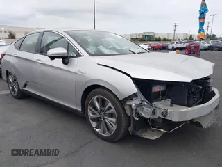 2018 Honda Clarity Touring with VIN JHMZC5F32JC014588, listed as a IAAI auction lot 42066633 with 89,316 mi miles. Bid and sale history available at carsss.com. Image 1.