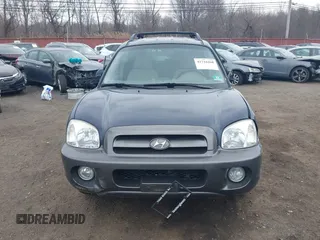 2005 Hyundai Santa Fe GLS with VIN KM8SC13D55U927740, listed as a IAAI auction lot 41716268 with 67,998 mi miles. Bid and sale history available at carsss.com. Image 12.