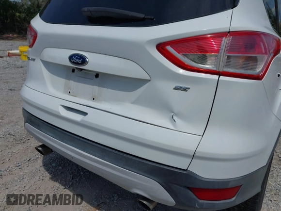 2015 Ford Escape SE with VIN 1FMCU0G74FUB88670, listed as a IAAI auction lot 42115919 with 129,969 mi miles. Bid and sale history available at carsss.com. Image 6.